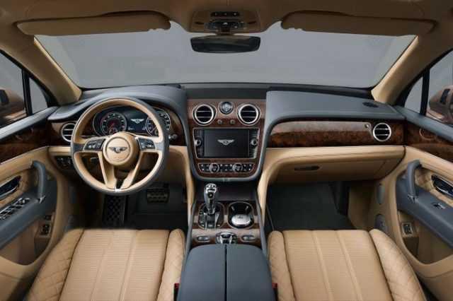 Bentley Bentayga model 2019 có nhiều chi tiết nội thất dạng tròn như dòng xe Mini Cooper. Nguồn: motortrend.com