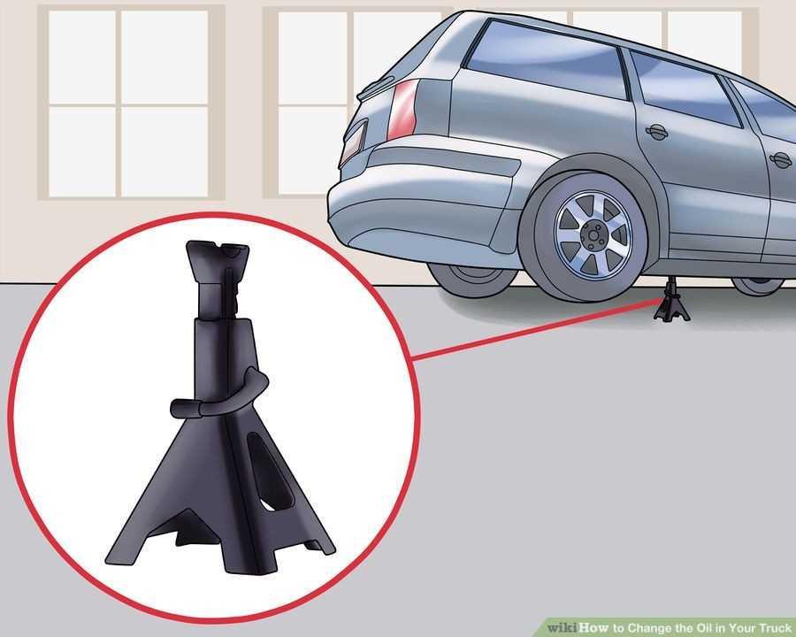 Kích phần đầu xe và dùng đội kê để cố định