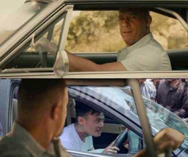 Nhìn chăm chú vào chiếc xe phía trước khi lái xe ô tô